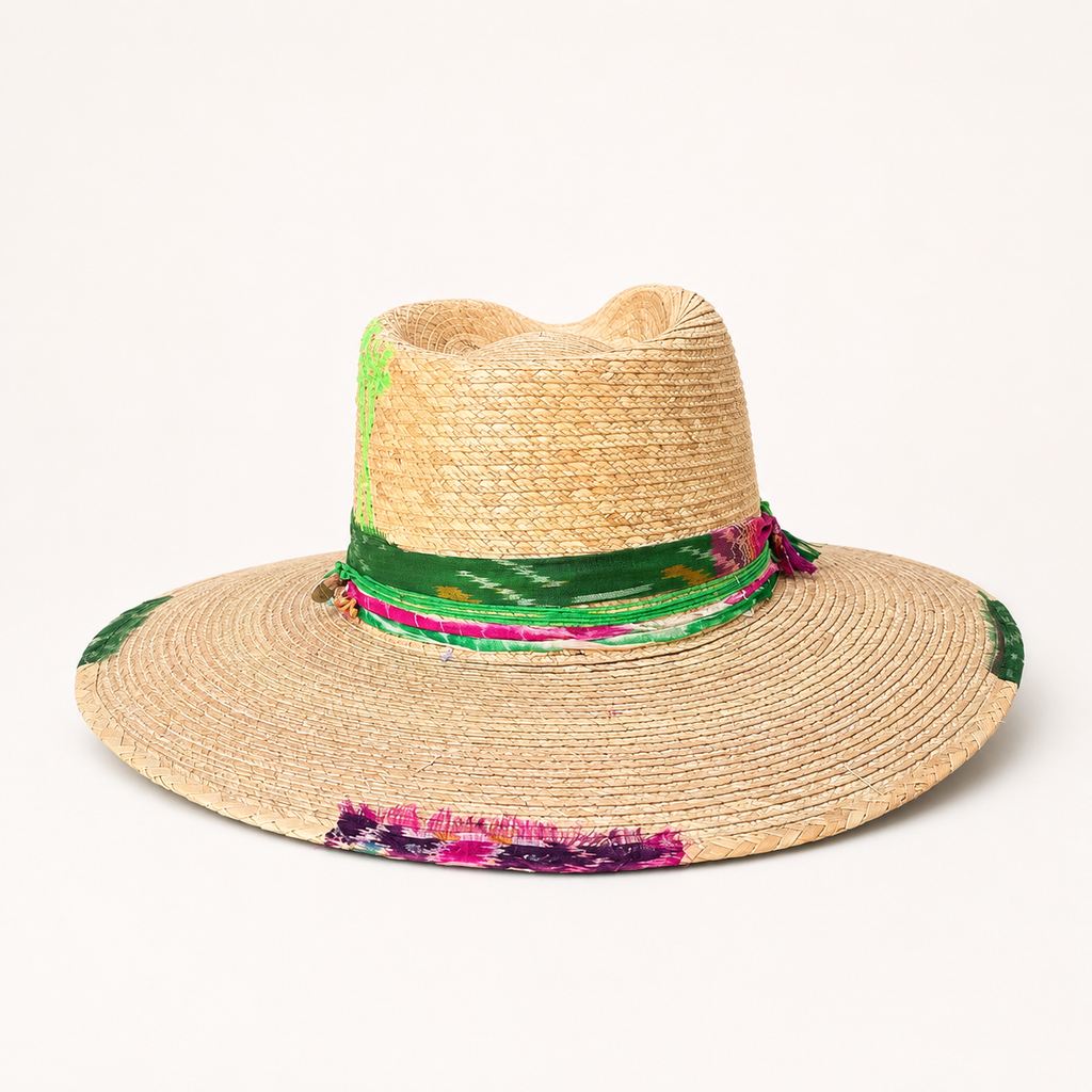 Rear view showing the straw weave, colorful band, and softly shaped brim edge.