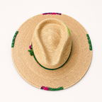 Side view highlighting the structured crown, wide brim, and layered green crown band.